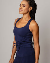 woman wearing tank top in ink navy on grey background