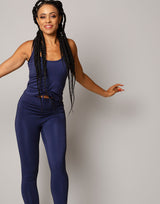 woman wearing tank top in ink navy on grey background