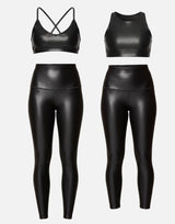 Black shimmer sports bra and leggings set on a white background