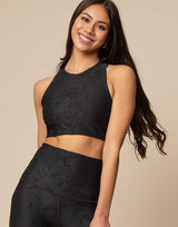 woman wearing chic woven star printed crop top on grey background