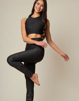 woman wearing chic woven star printed crop top on grey background