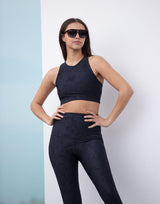 woman wearing chic woven star printed crop top on grey background