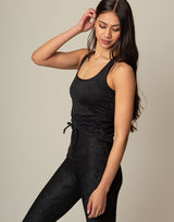 woman wearing chic woven star printed tank on grey background