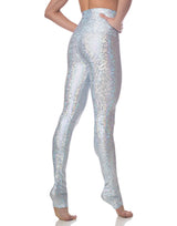 woman wearing long legging with mermaid pattern of crystal blue colored sparkling fish scales on grey background