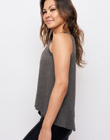 woman wearing tank top in charcoal grey on grey background