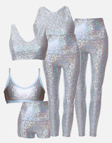 Silver sequin sports bra, leggings, and shorts set on a white background