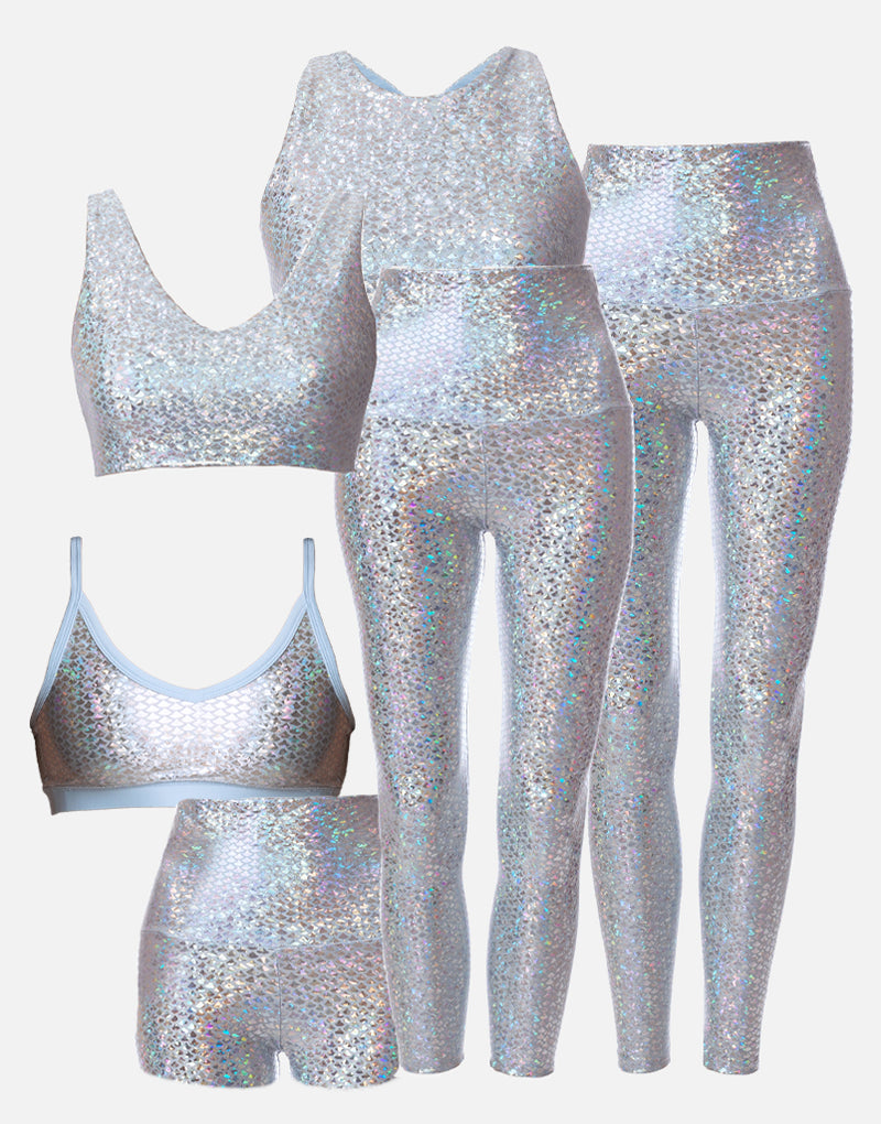 Silver sequin sports bra, leggings, and shorts set on a white background
