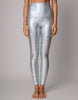 light blue fish scale leggings worn by a person on a gray background