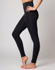 A model wearing black high-waisted leggings, shown from the waist down in a side-profile pose against a light gray studio background.