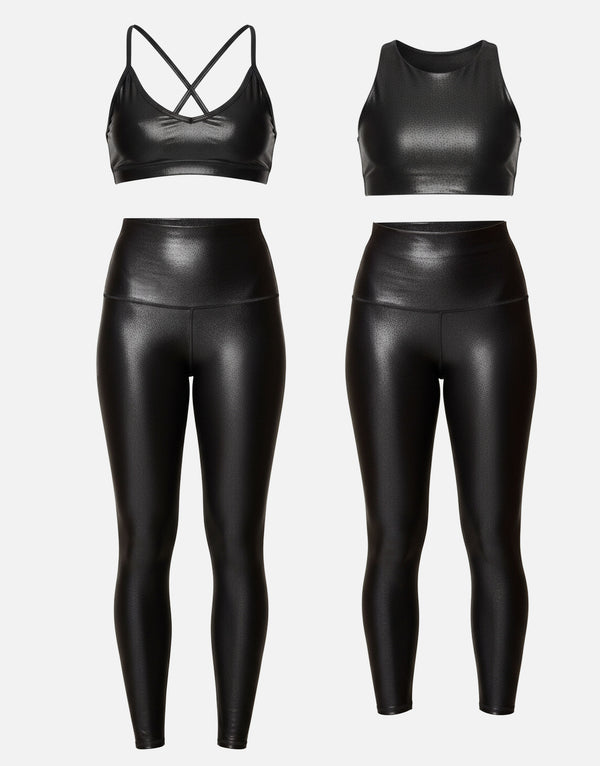 Black shimmer sports bra and leggings set on a white background