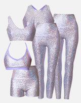 lavender fish scale sports bra, leggings, and shorts set on a white background