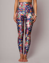 Floral patterned leggings worn by a person on a plain background
